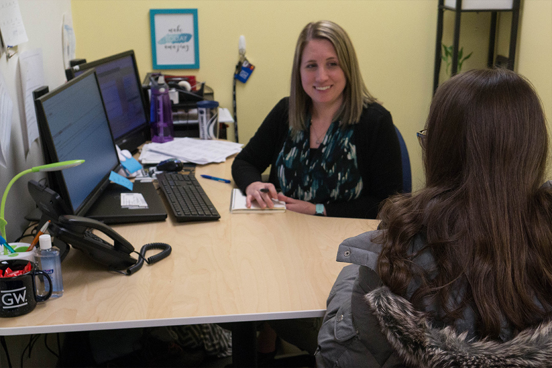 CCAS Advisor Callan Betaharon meets with a student