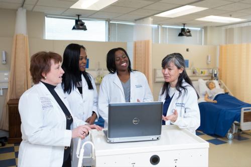Nursing students and faculty in a clinic