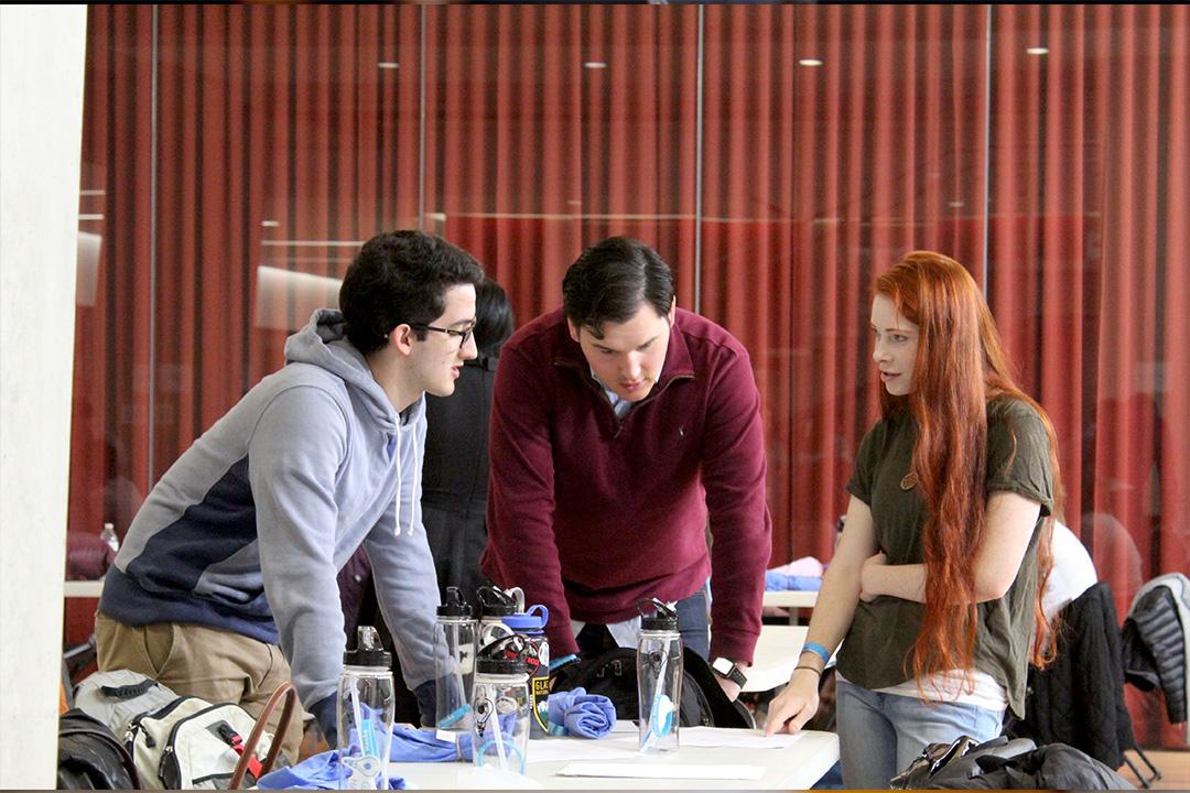 3 students at a GeorgeHack event